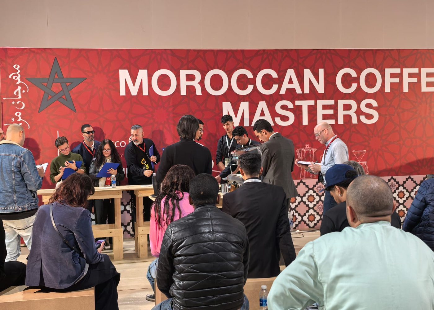 Baristas competing in front of the festival audience